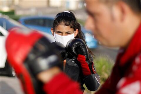 Young Female Boxers Trade Jabs and Punches on the Beach in Gaza