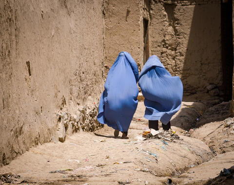 Afghan Photographer Spotlights The Beauty of Women Under The Rubble of War