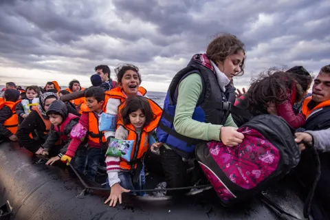 Hundreds of Migrants Flee Libya, Tunisia to Italian Island