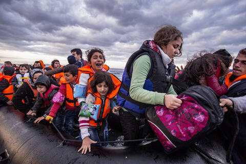 Hundreds of Migrants Flee Libya, Tunisia to Italian Island
