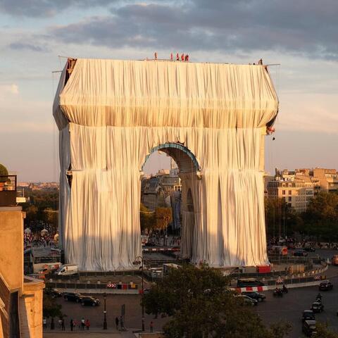 Artist Christo Wraps Paris’ Arc De Triomphe in Silvery Blue Fabric