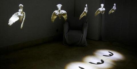 Exhibit: Ceramic Pigeons Speak of Syrian Devastation - AFP 