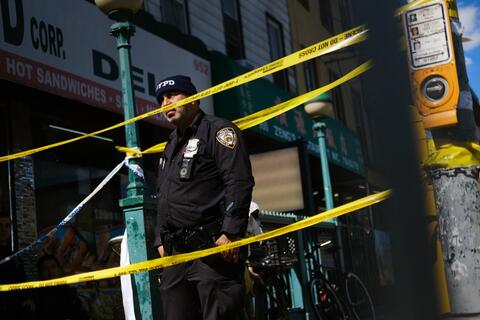 New York Police Chase Subway Gunman Who Shot 29 People