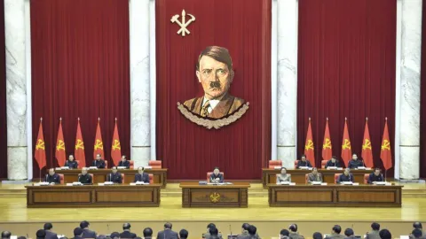 Was Hitler photo raised behind Kim Jong Un?