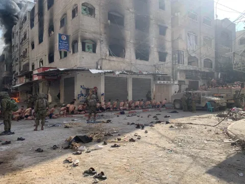 Israeli forces accused of field executions and killing civilians with white flags in Gaza