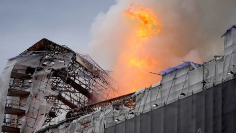 Massive fire engulfs old stock exchange in Copenhagen, Denmark