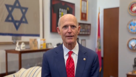 Rick Scott sparks outrage for displaying Israeli flag over US flag
