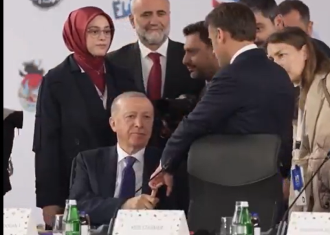 Erdogan grabs Macron’s finger in viral summit moment
