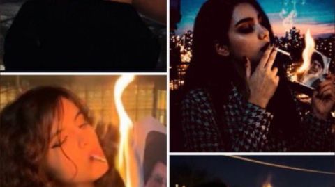 فيديو جريء يهز إيران: شابة تحرق صورة خامنئي وتشعل بها سيجارتها
