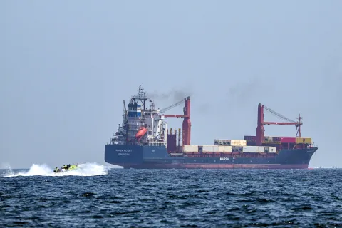 Cargo ship hit near Strait of Hormuz as Iran-Oman shipping dispute escalates