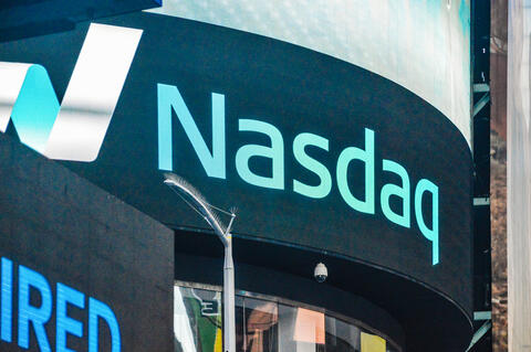 Tesla Lifts Nasdaq to Record-High Close